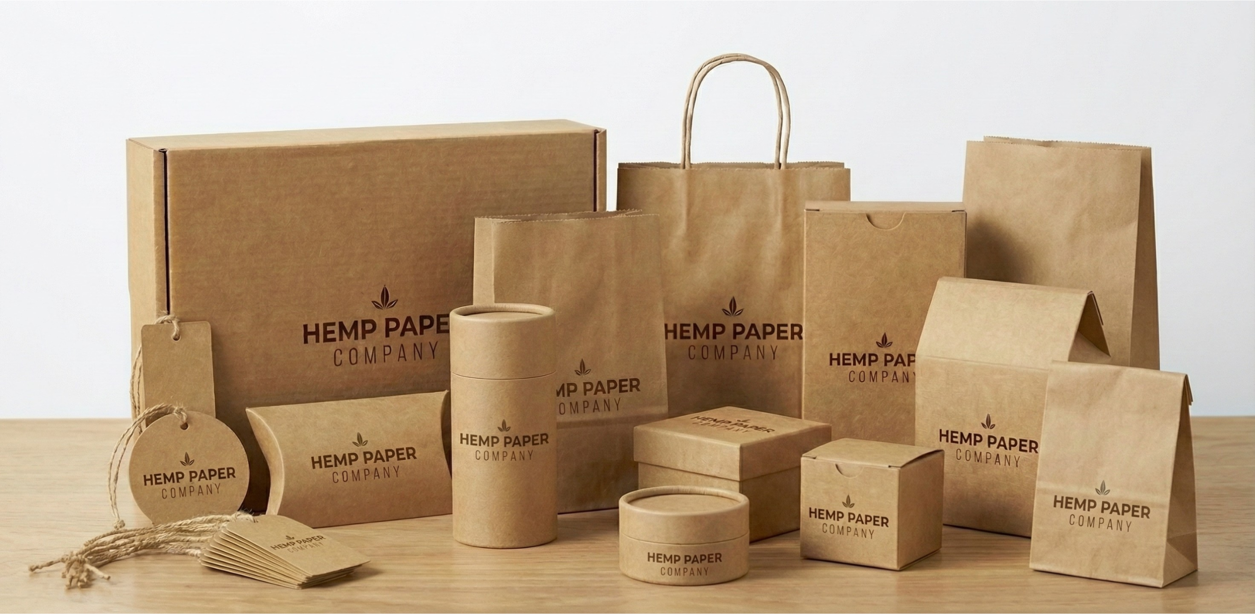 Full collection of hemp paper bags, cartons, boxes, and tubes with Hemp Paper Company logo — ZERO TREE packaging